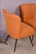 Pair of mid-century style chairs with orange fabric and black metal legs; 1116-480