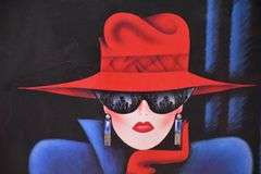 Framed poster of a woman with red hat by Erik Freyman; 5948-034