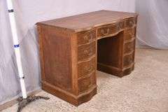 Mahogany serpentine front kneehole desk; 1148-008