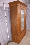 Inlaid oak 3 part armoire with beveled mirror door; 55-11191