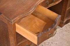 Mahogany serpentine front kneehole desk; 1148-008