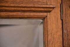 Inlaid oak 3 part armoire with beveled mirror door; 55-11191
