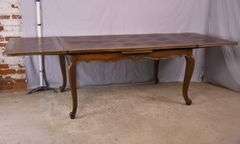 Oak French style draw-leaf dining table with parquet top; 495-328