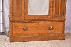 Inlaid oak 3 part armoire with beveled mirror door; 55-11191