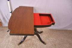 Mahogany flip-top game table with black and gold lyre pedestal base; 495-313