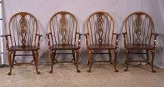 Set of 4 Pennsylvania House cherry Windsor style open arm chairs with stretcher bases; 155-825