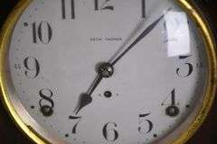 Seth Thomas clock with convex glass door and mahogany case; 6117-016