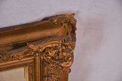 Mirror with ornate gold frame; 74-11631E