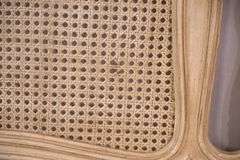 Carved off-white king size headboard with caned panels; 68-5251