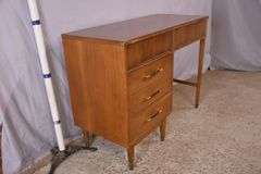 Walnut mid-century style kneehole desk with Formica top; 55-11224