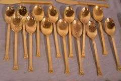 SRI "Royalty" gold toned stainless flatware set; 14-2666