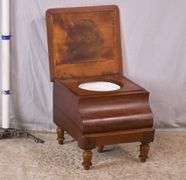 Early mahogany chamber pot with turned legs; 6117-047