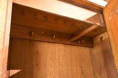Inlaid oak 3 part armoire with beveled mirror door; 55-11191
