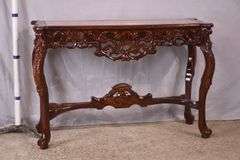 Carved mahogany console table with pink marble top; 495-318