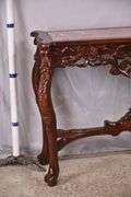 Carved mahogany console table with pink marble top; 495-318