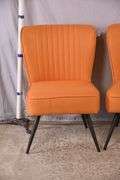 Pair of mid-century style chairs with orange fabric and black metal legs; 1116-480