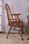 Set of 4 Pennsylvania House cherry Windsor style open arm chairs with stretcher bases; 155-825