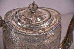 Philip Ashberry & Sons 4 piece silverplate tea and coffee service with ornate round serving tray; 1054-1304