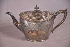 Philip Ashberry & Sons 4 piece silverplate tea and coffee service with ornate round serving tray; 1054-1304