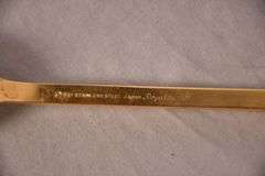 SRI "Royalty" gold toned stainless flatware set; 14-2666