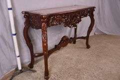 Carved mahogany console table with pink marble top; 495-318