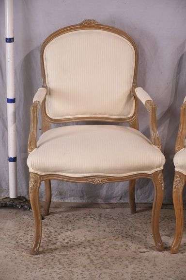 Pair of carved French style open armchairs; 336-4210