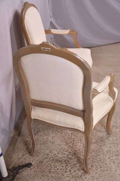 Pair of carved French style open armchairs; 336-4210