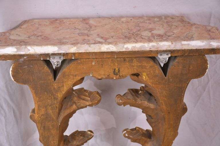 Large carved gold wall shelf with marble shelf; 55-11606