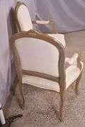 Pair of carved French style open armchairs; 336-4210