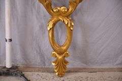 Large carved gold wall shelf with marble shelf; 55-11606