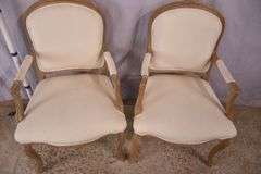 Pair of carved French style open armchairs; 336-4210