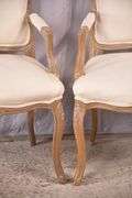 Pair of carved French style open armchairs; 336-4210
