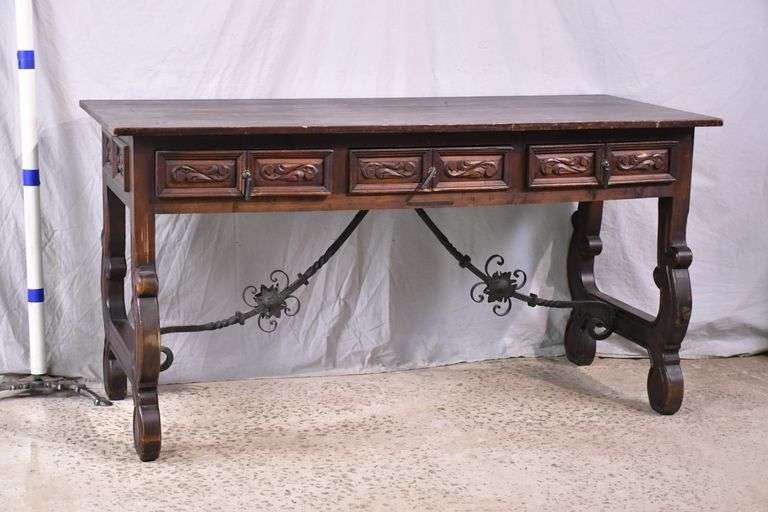 Carved Spanish style 3 drawer console/library table with ornate iron supports; 55-12430