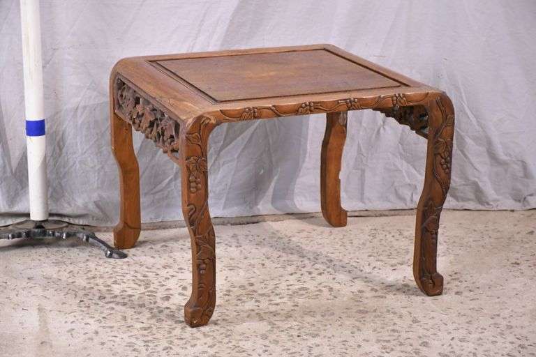 Carved side table with raised panel top; 55-12427