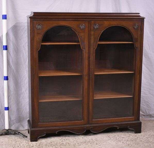 Walnut 2 door bookcase with adjustable shelves; 68-7737