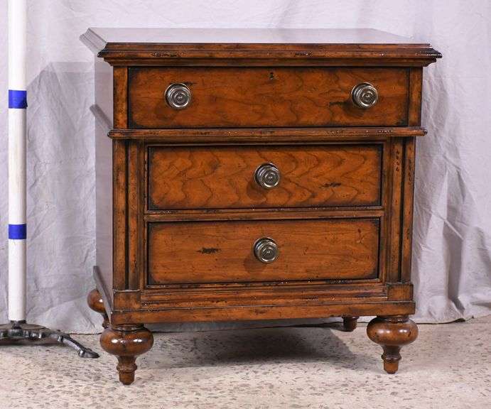 Stanley distressed cherry 3 drawer bedside chest with turned legs; 68-7847