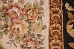 8.0'x10.2' hand knotted Indo-Tibetan rug with black field; 40-136773