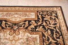 8.0'x10.2' hand knotted Indo-Tibetan rug with black field; 40-136773