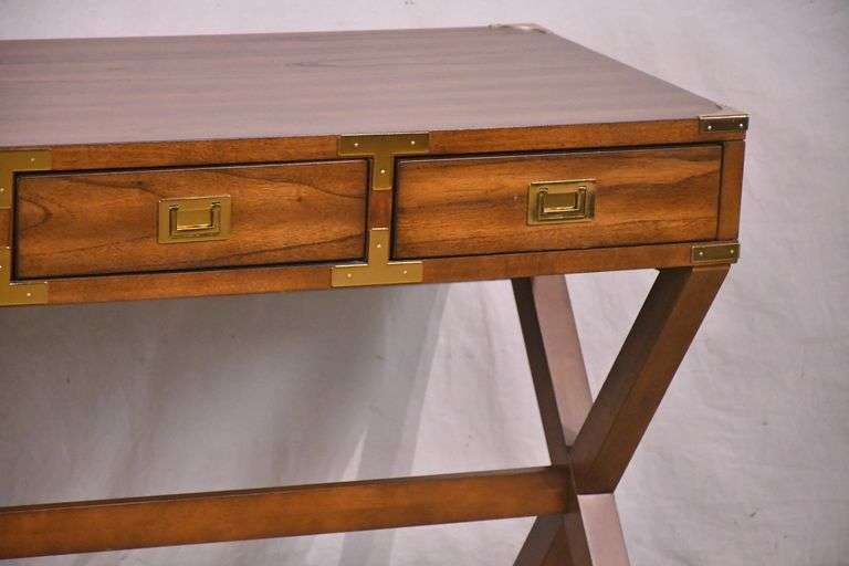 Campaign style 3 drawer writing table with trestle base; 68-6716