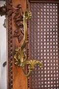 Ornate walnut beveled mirror hall tree with marble shelf and drawer; 68-6670