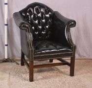 Painted black leather armchair with tufted back and seat; 336-4498