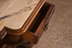 Ornate walnut beveled mirror hall tree with marble shelf and drawer; 68-6670