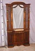 Ornate walnut beveled mirror hall tree with marble shelf and drawer; 68-6670