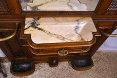Ornate walnut beveled mirror hall tree with marble shelf and drawer; 68-6670