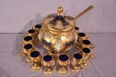 Pauly & Co. gold and floral painted cobalt blue glass punch bowl set; 191-597