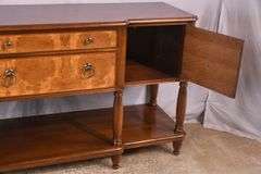 Milling Road by Baker two-tier sideboard with turned columns and legs; 68-6640