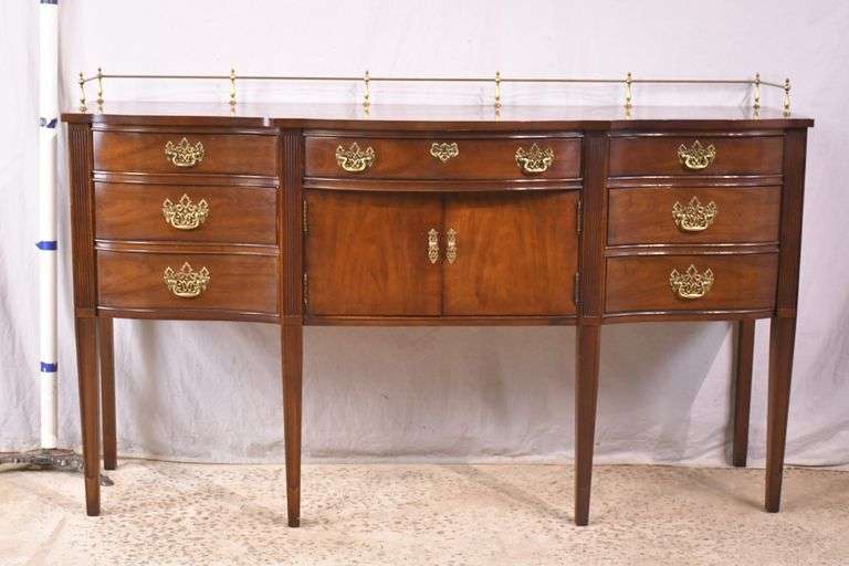 Thomasville cherry serpentine front sideboard with brass rail; 68-6940