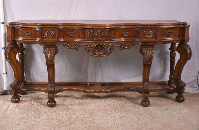Carved walnut serpentine front 3 drawer sideboard; 74-12809A