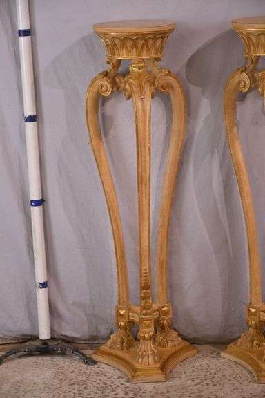 Pair of tall carved plant stands with paw feet; 68-6854