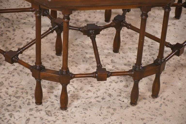 Mahogany octagonal glass top coffee table with cane-cut legs and stretchers; 68-6514